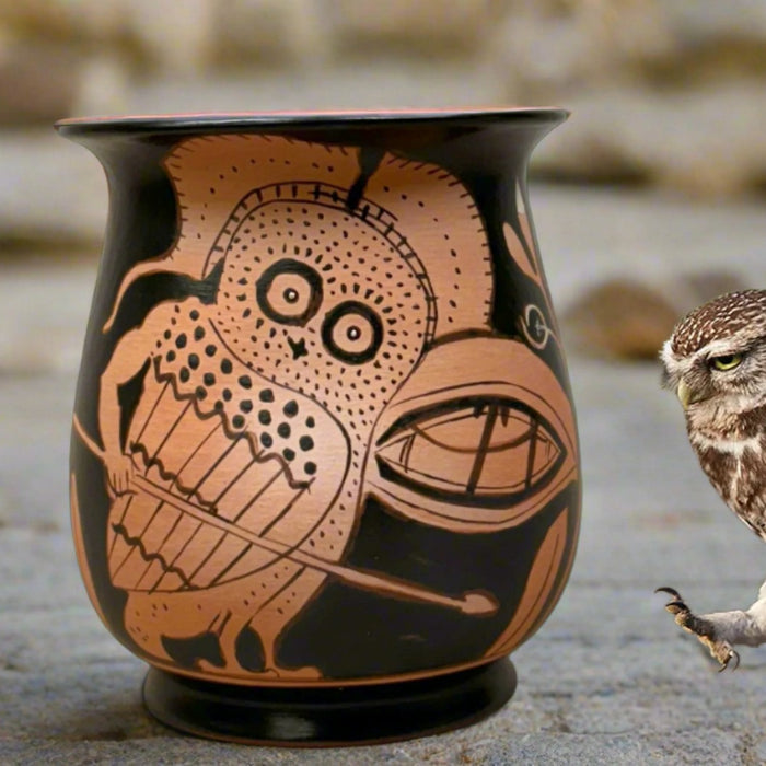red figure mug depicting an owl the symbol of wisdom in ancient Athens