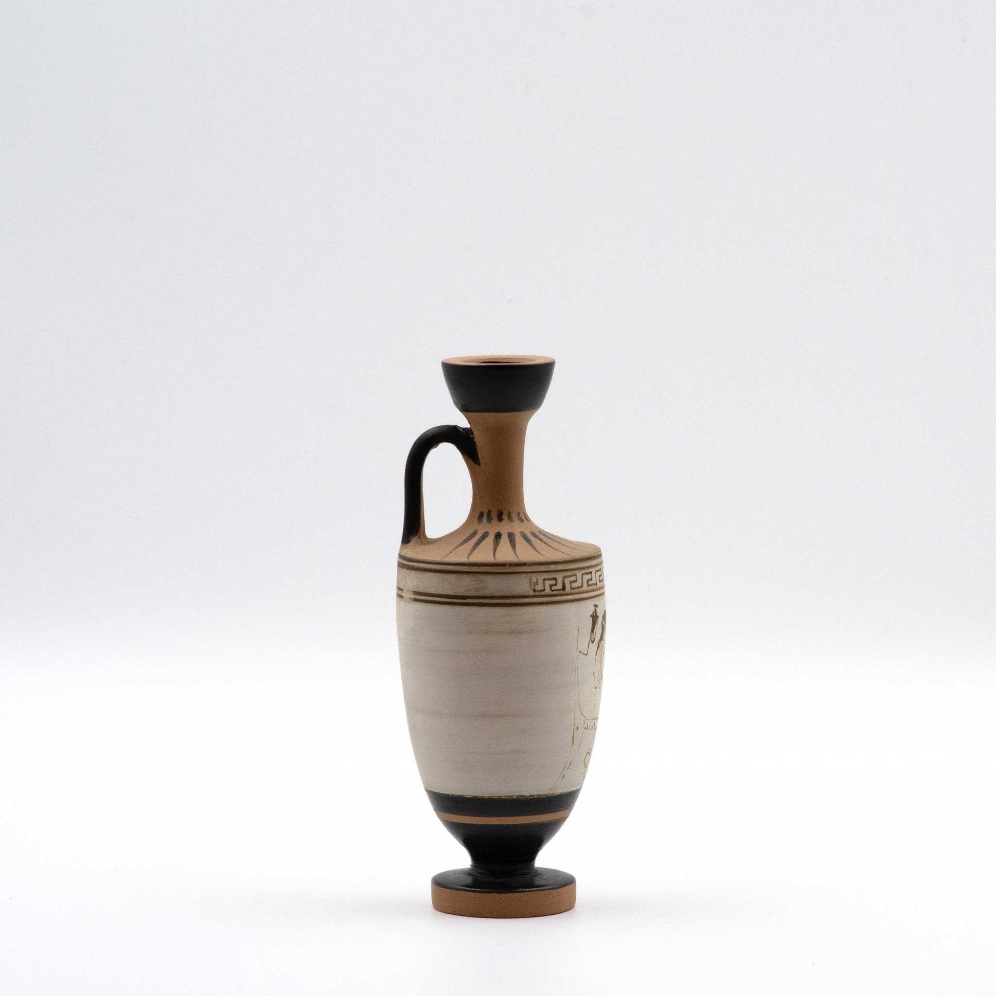 White lekythos with a seated woman