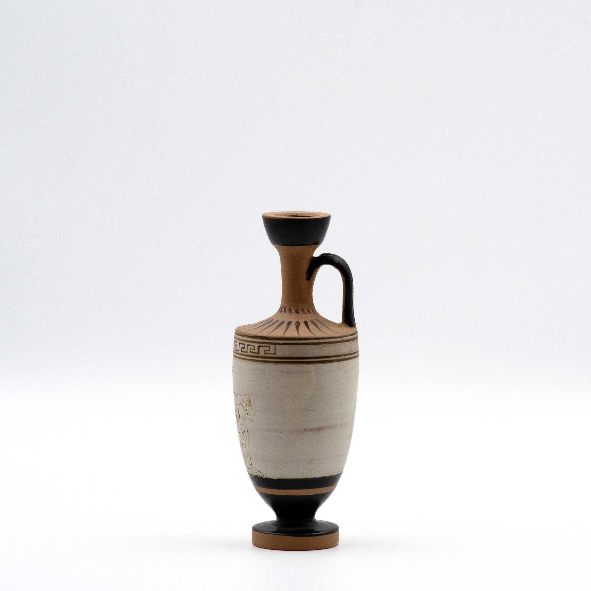 White lekythos with a seated woman