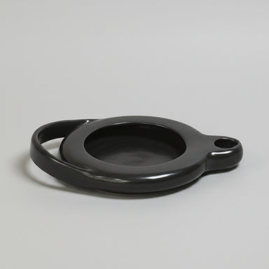black ceramic oil lamp