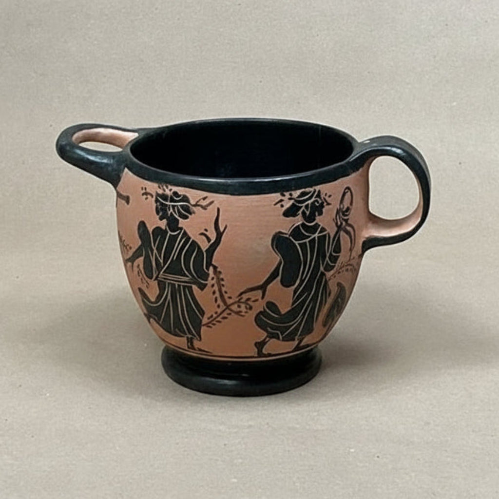 Ceramic cup with black handles and black figures on a beige background