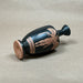 Black ceramic bottle with red decorative elements on a white background