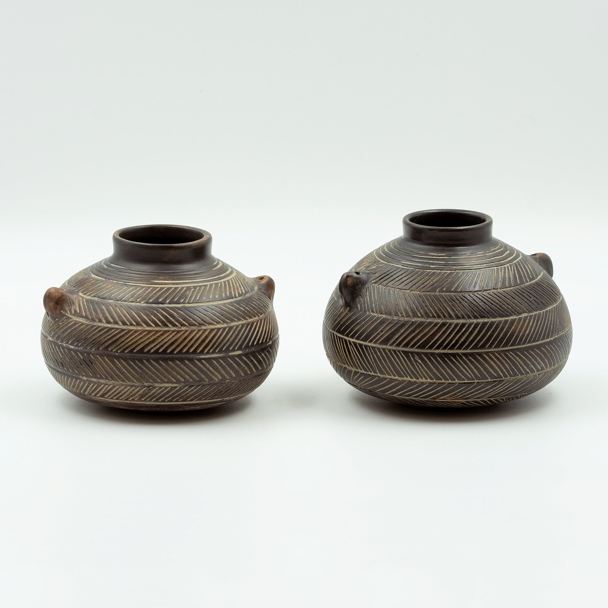 Thera Black incised Pyxis "kandila'