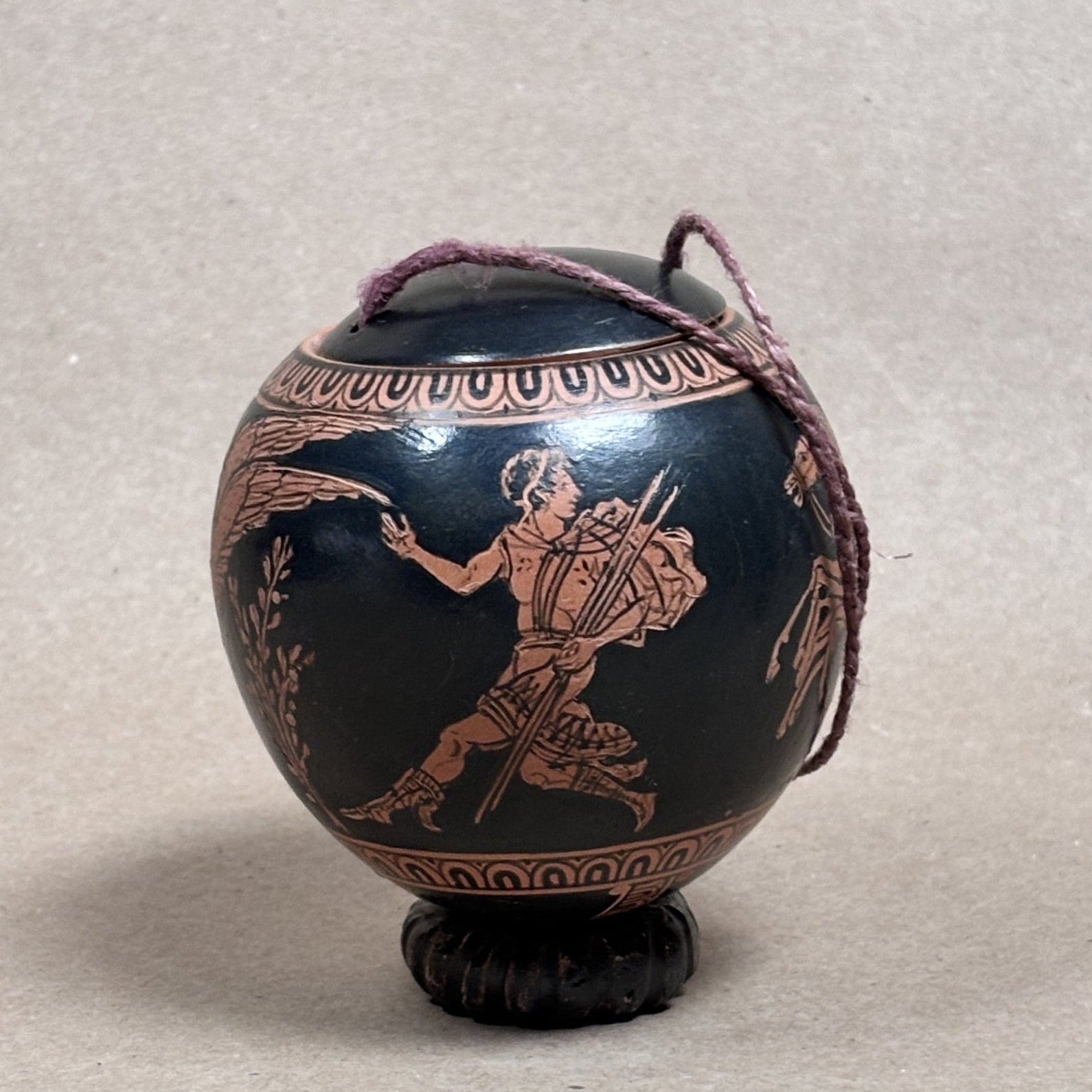 Decorative egg with classical design on a gray background