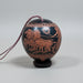 Decorative urn with classical design on a white background