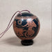 Decorative urn with classical design on a neutral background