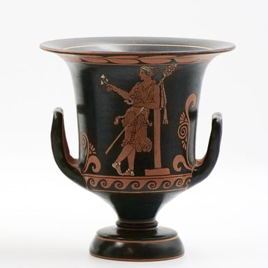 A black and red figure Maenad calyx krater with decorative patterns and a youthful maenad figure depicted on the side.