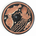 Decorative plate with fish and squid design on a black background