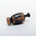 Black ceramic bottle with red decorative elements on a white background