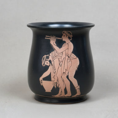 Black glazed mug with red-figure classical Greek scene on a terracotta background