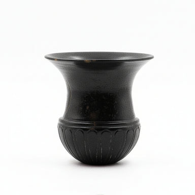 Black ceramic vase on a white background