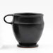 Black ceramic mug on a white background