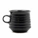 Black glazed ribbed mug with a handle, based on an ancient design from the Ancient Agora of Athens.