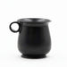 A black glazed ceramic mug with a tulip shape and a handle on the side.