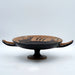Handmade ancient Greek ceramic kylix with black-figure ship and dolphin design on pedestal