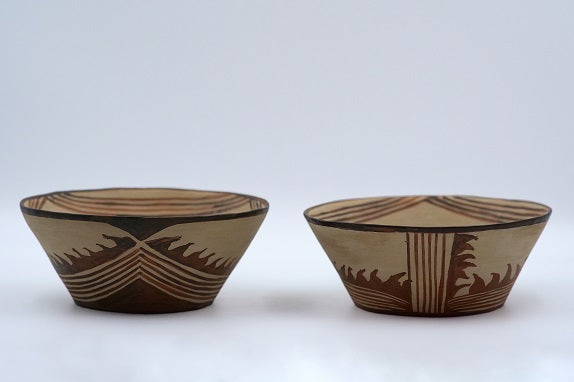Two Sesklo bowls  with flame geometric decoration