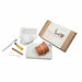 Mycenaean ceramic excavation and conservation kit with pottery, tools and box on white background