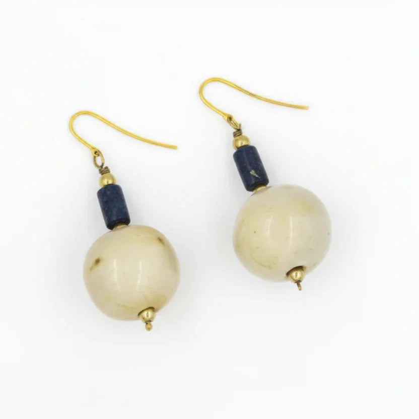 A pair of glazed bead and lapis drop earrings with gold-colored clasps on a white background.