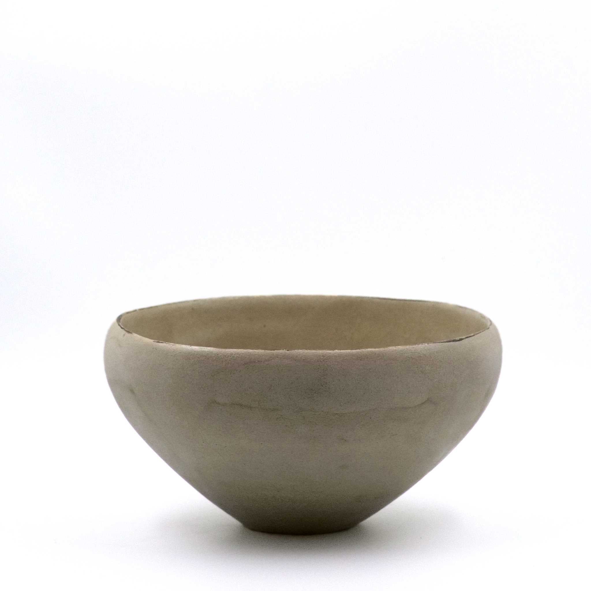 A plain conical bowl with a matte grey finish, hand built and glazed stoneware.