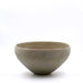 A plain conical bowl with a matte grey finish, hand built and glazed stoneware.