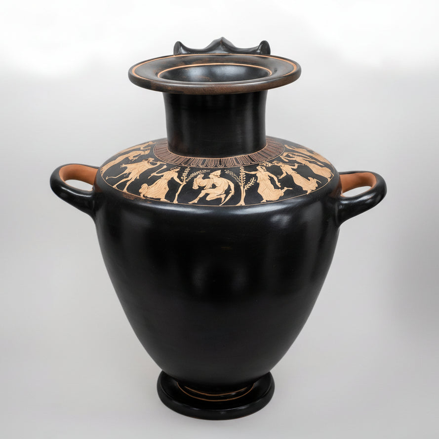 Black ceramic urn with gold decorative patterns on a white background